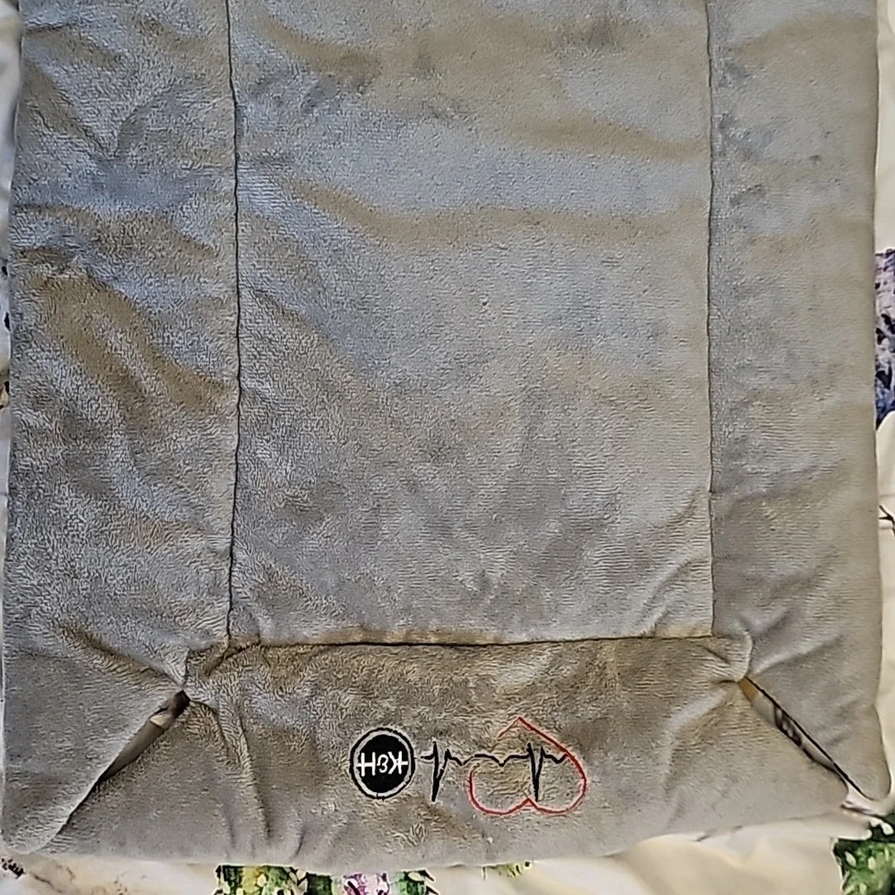 Puppy bed with heartbeat device